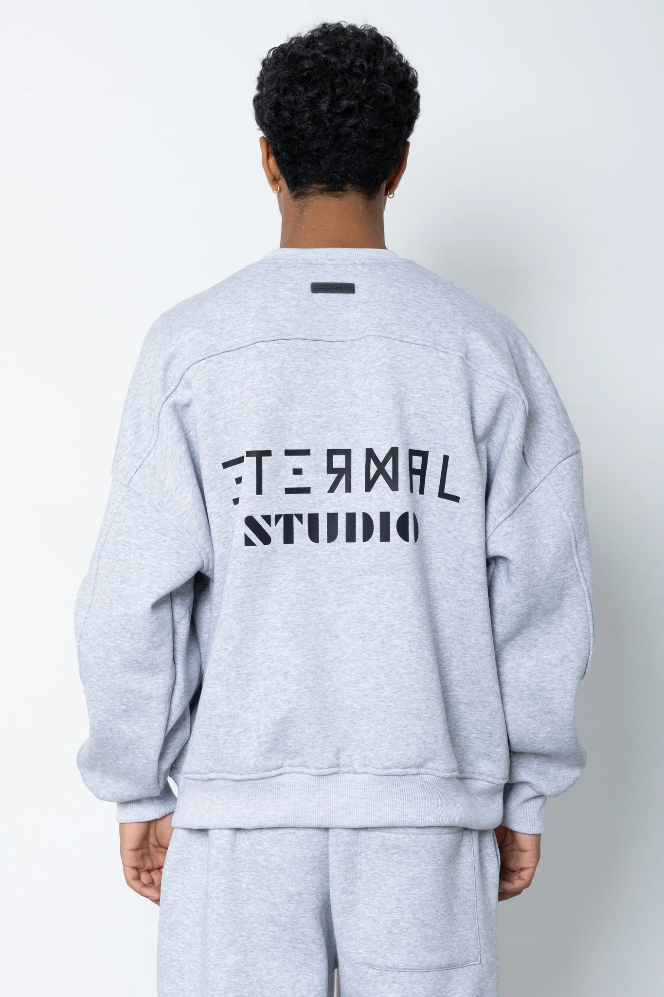 Felpa girocollo logo brick Eternal Studio