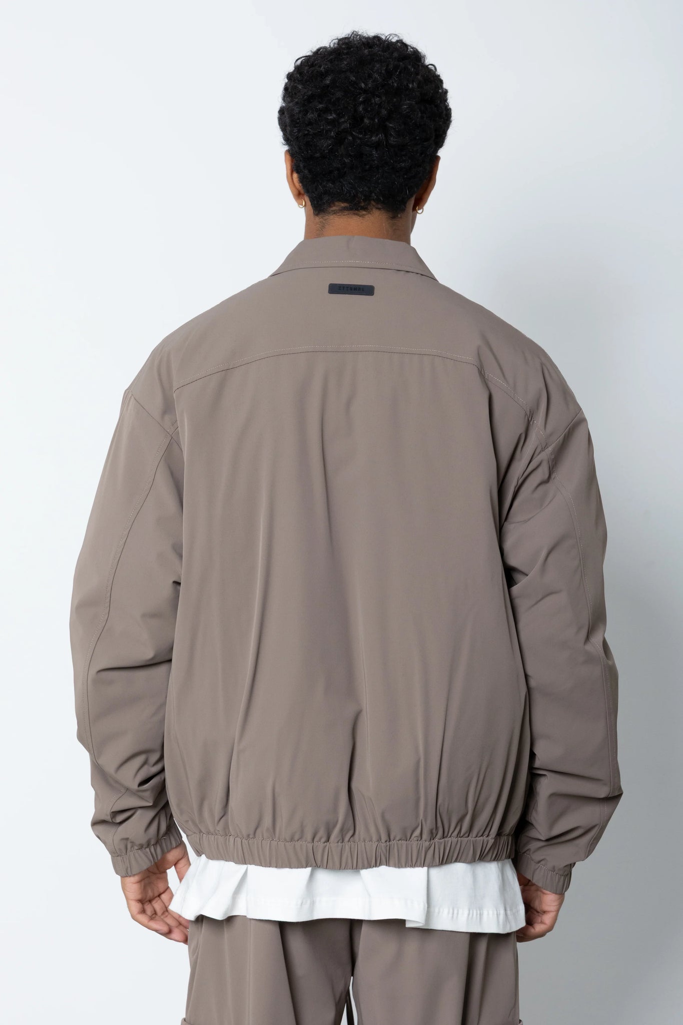 Giubbino in tessuto tecnico Eternal Studio